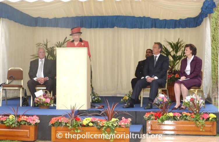 the queen with michael winner tony blair and cherie blair addressing an audience