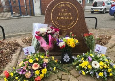 flowers at the memorial of PC Armitage to commemorate the 20th anniversary of her death