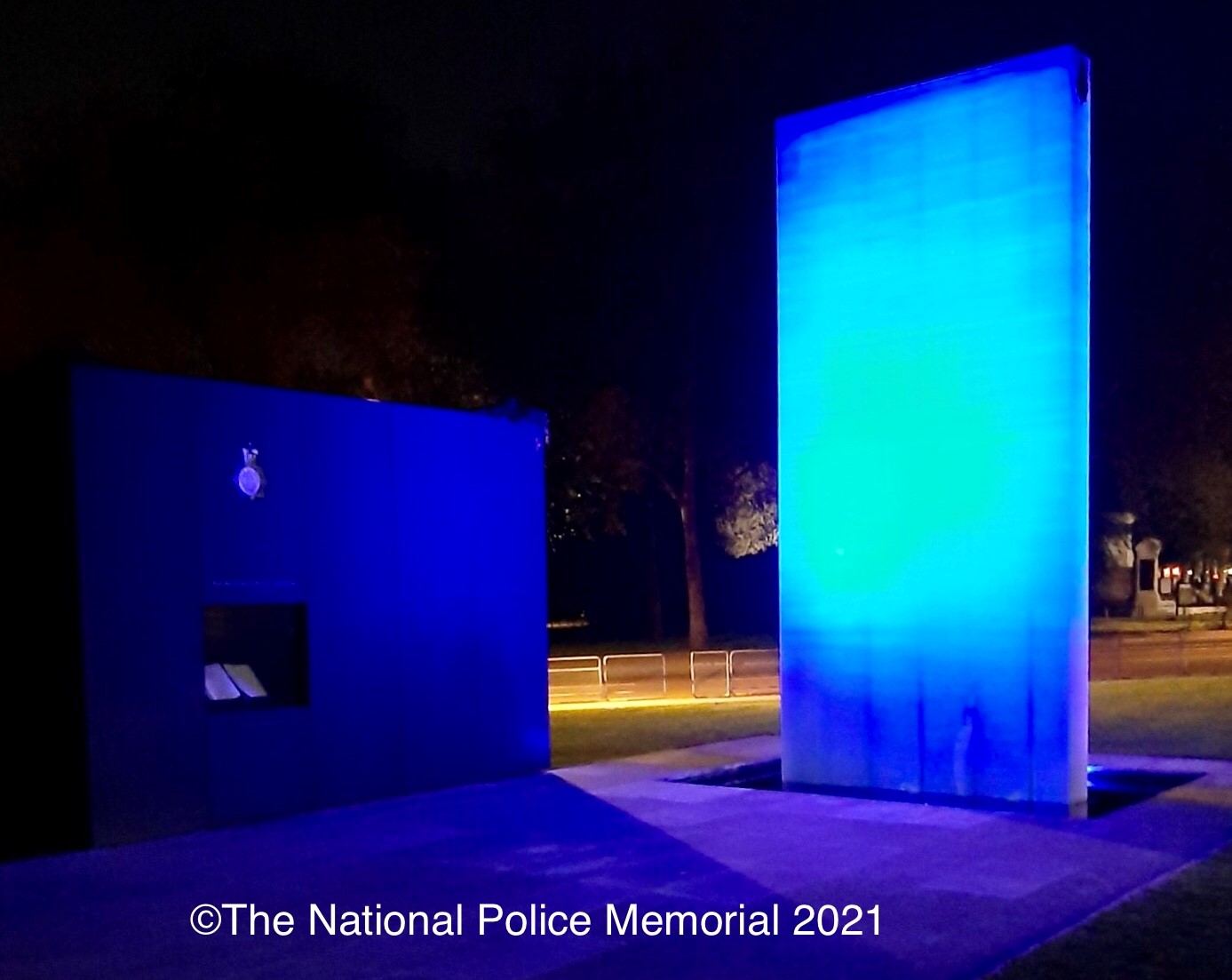 the national police memorial illuminated at night